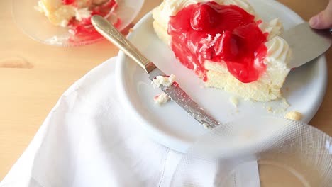 Man-serves-slice-of-strawberry-cake