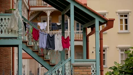 Clean-clothes-hanging-on-the-rope,-ordinary-life-of-local-people,-laundry-day