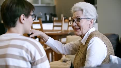 Elderly-Lady-Talking-with-Young-Woman