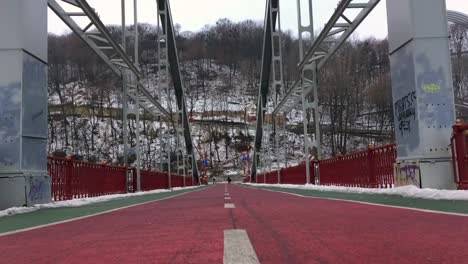 A-man-bicycling-at-the-Pedestrian-bridge