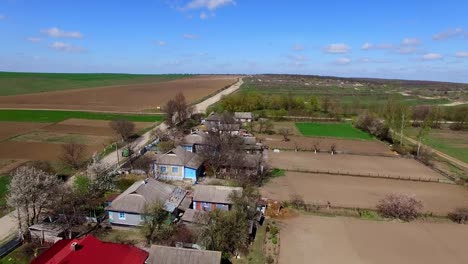 aerial-view-of-beautiful-streets,-houses-and-blue-sky