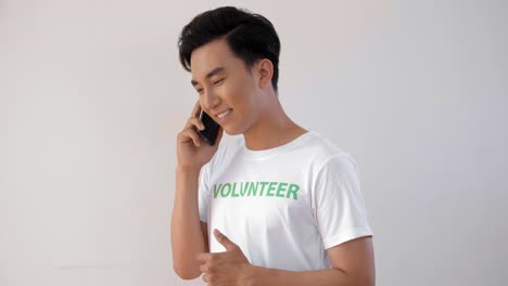 Male-Volunteer-with-Phone