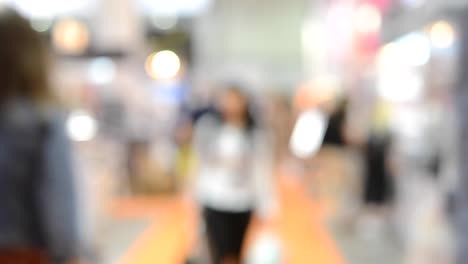 Many-people-walk-inside-the-mall-exhibition-store