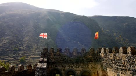 view-from-the-bastion,-moat-and-main-outer-wall-at-the-front-of-a-large-ancient-castle