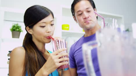 Healthy-lifestyle-Ethnic-couple-drinking-organic-fruit-smoothie