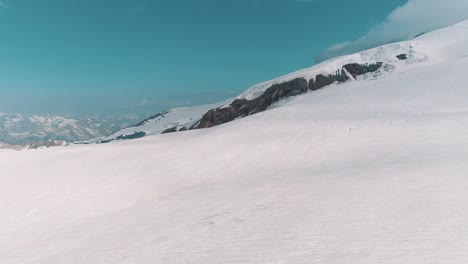 Aerial-view-of-scenic-nature-snowy-rocky-mountain-landscape