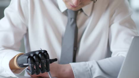 Footage-Compilation-of-Amputee-Businessman-Writing-with-Prosthetic-Hand