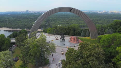 Aerial-view-of-the-Arch-of-Friendship-of-Peoples,-new-bicycle-and-pedestrian-bridge,-Parkovaya-Road,-Kiev