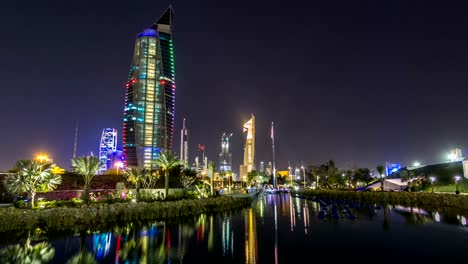 Music-fountains-in-park-with-Kuwait-City-cityscape-night-timelapse-hyperlapse