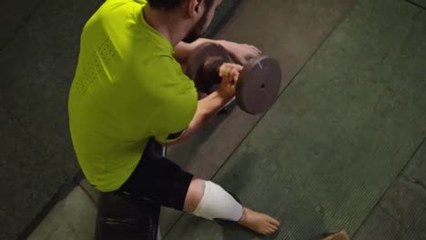 Man-with-Prosthetic-Foot-Lifting-Dumbbell