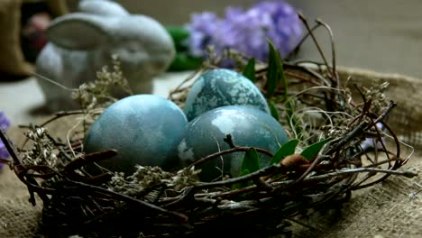 Hyacinth-flower-falls-onto-the-Easter-nest-with-Naturally-dyed-eggs