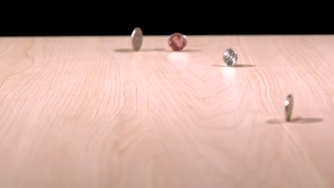 slow-motion-coins-spinning-on-table