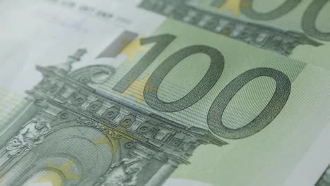 Lot-of-EU-banknotes-on-table-shallow-DOF-close-up