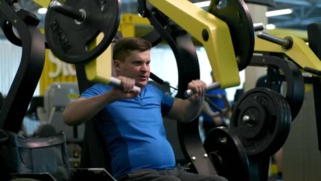 Disabled-Man-Training-on-Chest-Press-Machine