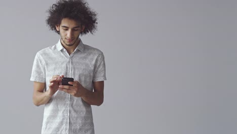 Young-man-using-mobile-phone