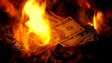 Cash-Is-Thrown-On-Fire