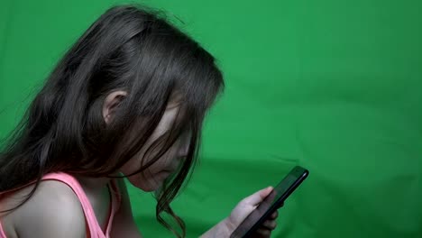 Little-girl-watching-video-on-a-smartphone