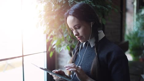 Young-Girl-Using-Tablet