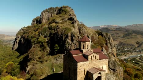 4K-UHD-Aerial-view-of-a-mountain-monastery-standing-on-a-cliff