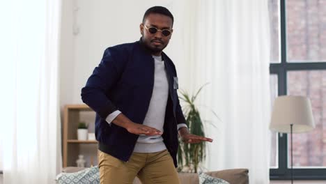 young-african-american-man-dancing-at-home