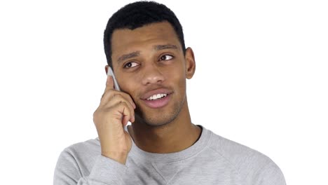 Afro-American-Man-at-Work-Talking-on-Smartphone-with-Customer