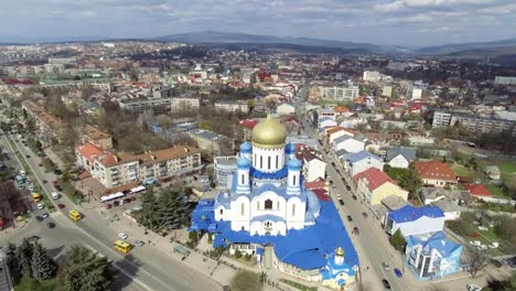 Aerial-footage-of-Uzhgorod-city-center---top-view-of-church-in-summer.-Day-time