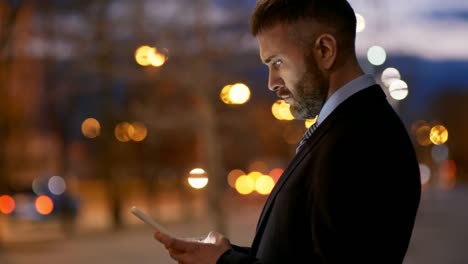 Businessman-with-Telephone-at-Night