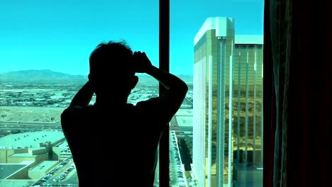 Man-taking-picture-of-Las-Vegas-view-in-slow-motion-250fps