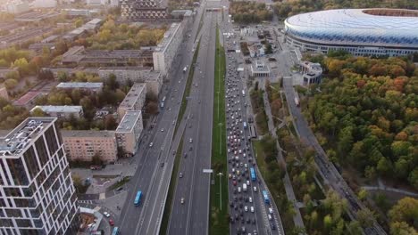 Panoramic-shooting-of-traffic-of-cars-from-the-height-on-the-central-street-of-the-city