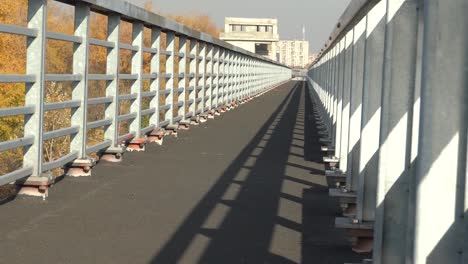 Unfinished-bridge-against-the-background-of-the-silhouette-of-the-city.-Unfinished-highway-away-city