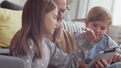 Granddad-Having-Great-Time-with-Grandchildren