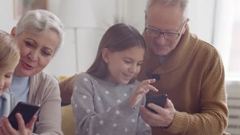 Children-Using-Gadgets-with-Grandparents