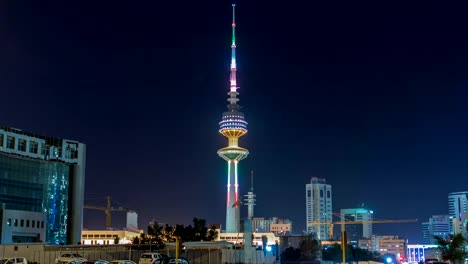 Der-Liberation-Tower-Timelapse-hyperlapse-in-Kuwait-Stadt,-beleuchtet-bei-Nacht.-Kuwait,-Naher-Osten