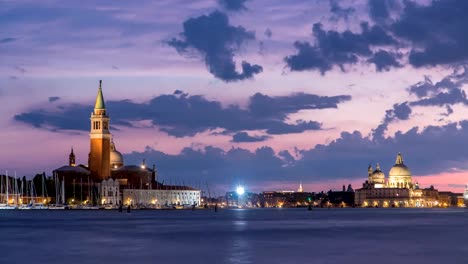 Boats-on-Grand-Canal-and-Basilica-Santa-Maria-della-Salute,-San-Giorgio-Maggiore-Island-day-to-night-timelapse,-Venezia,-Venice,-Italy