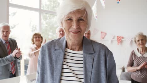 Beautiful-Senior-Lady-at-Dinner-Party-with-Friends