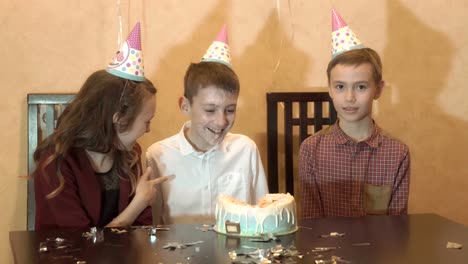children's-birthday-party.-birthday-cake-for-little-birthday-girl.-family-celebration.