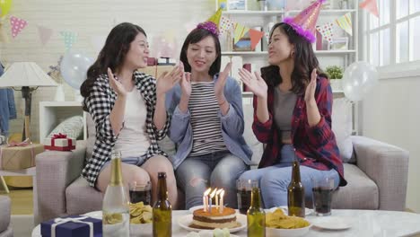 ladies-happily-singing-songs-celebrating-birthday