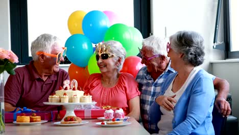 Senior-citizens-celebrating-birthday-party