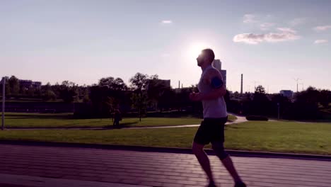 man-running-in-a-city-park