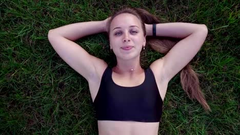 woman-lying-on-the-grass