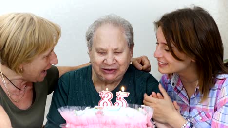 Happy-family-celebrates-grandmother's-birthday