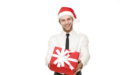 4k-Businessman-giving-present-to-camera-over-isolated-white-background.