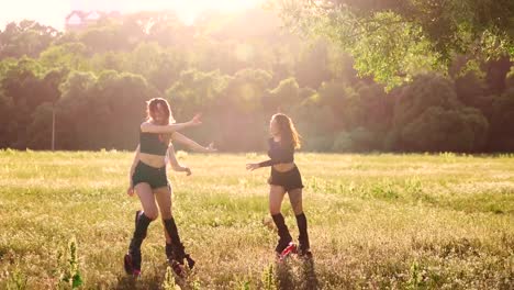 Group-training-kangoo.-Three-girls-at-sunset-in-the-Park-doing-fitness