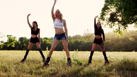 Three-girls-in-boots-on-springs-perform-fat-burning-exercises-in-group-training