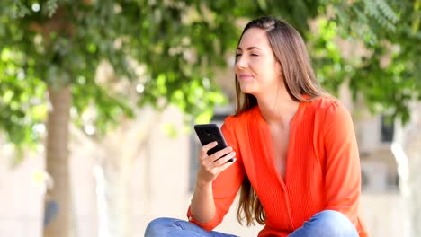 Woman-yawning-using-a-smart-phone