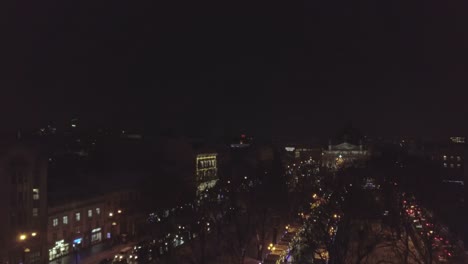 Lviv,-Ukraine---December-2018.-Arial-shot.-Lvov-Opera-house.-Christmas-tree.-Christmas-Fair.-People-are-walking-around-the-city-center.-Night-time