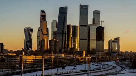 view-of-the-skyscrapers-and-towers-of-downtown-at-sunset,-time-lapse