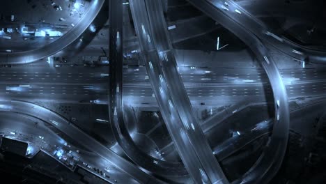 Highway-interchange-with-traffic.-Aerial-shot.-UHD,-4K