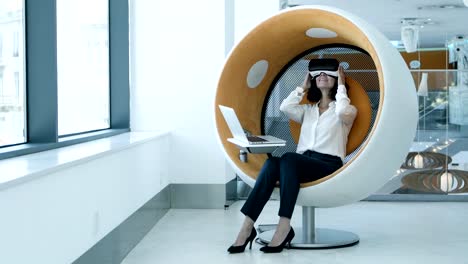 Content-businesswoman-in-vr-headset