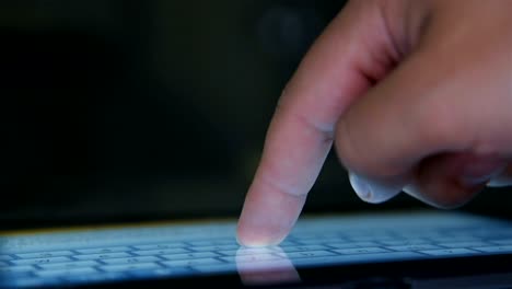 Hand-Typing-On-A-Virtual-Keyboard-Of-Digital-Tablet-Computer.